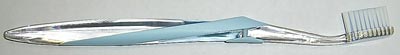 Best toothbrush is small head and soft bristles with rounded tips of uniform length.